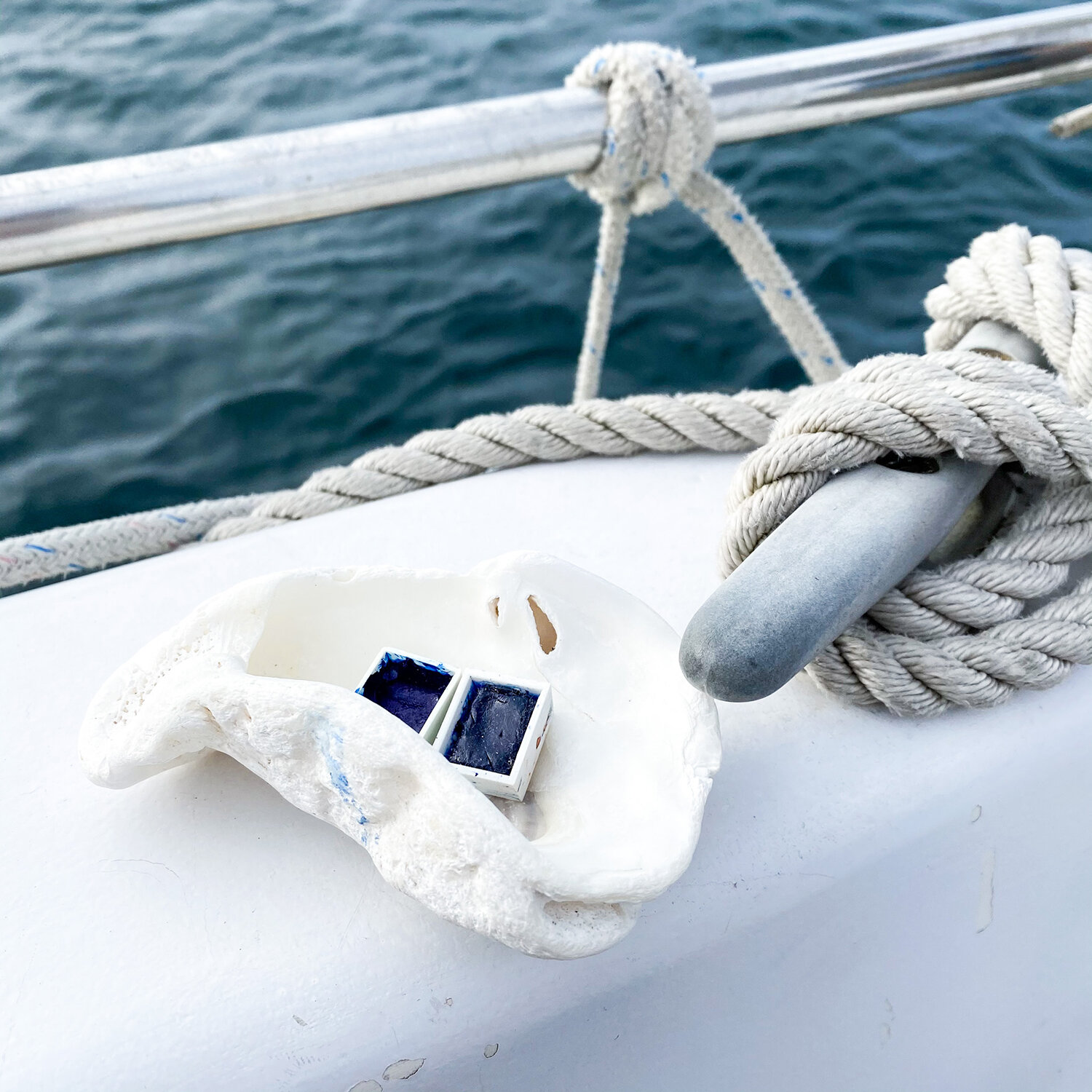 Oyster shell watercolour palette on sailboat